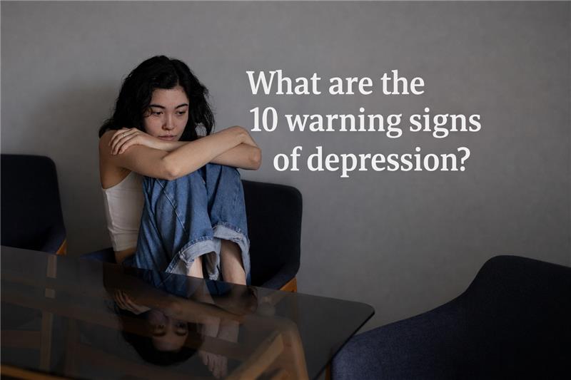 Woman sitting alone looking sad, representing early warning signs of depression and emotional distress